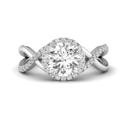 Round cut lab grown diamond halo engagement ring featuring a bypass split shank with pavé round diamonds in a white gold tone design.