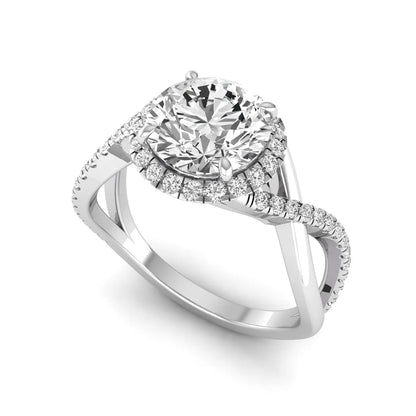 Round cut lab grown diamond halo engagement ring featuring a bypass split shank with pavé round diamonds in a white gold tone design.