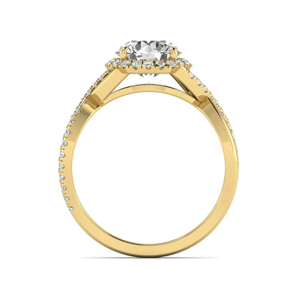 Round cut lab grown diamond halo engagement ring featuring a bypass split shank with pavé round diamonds in a yellow gold tone design.