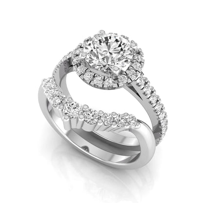 Round cut lab grown diamond halo bridal ring set featuring a pavé engagement ring with matching curved diamond wedding band in white gold finish.
