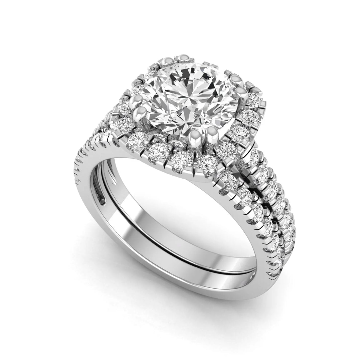 Round cut lab grown diamond halo bridal ring set featuring a split pavé engagement ring with matching diamond wedding band in white gold finish.