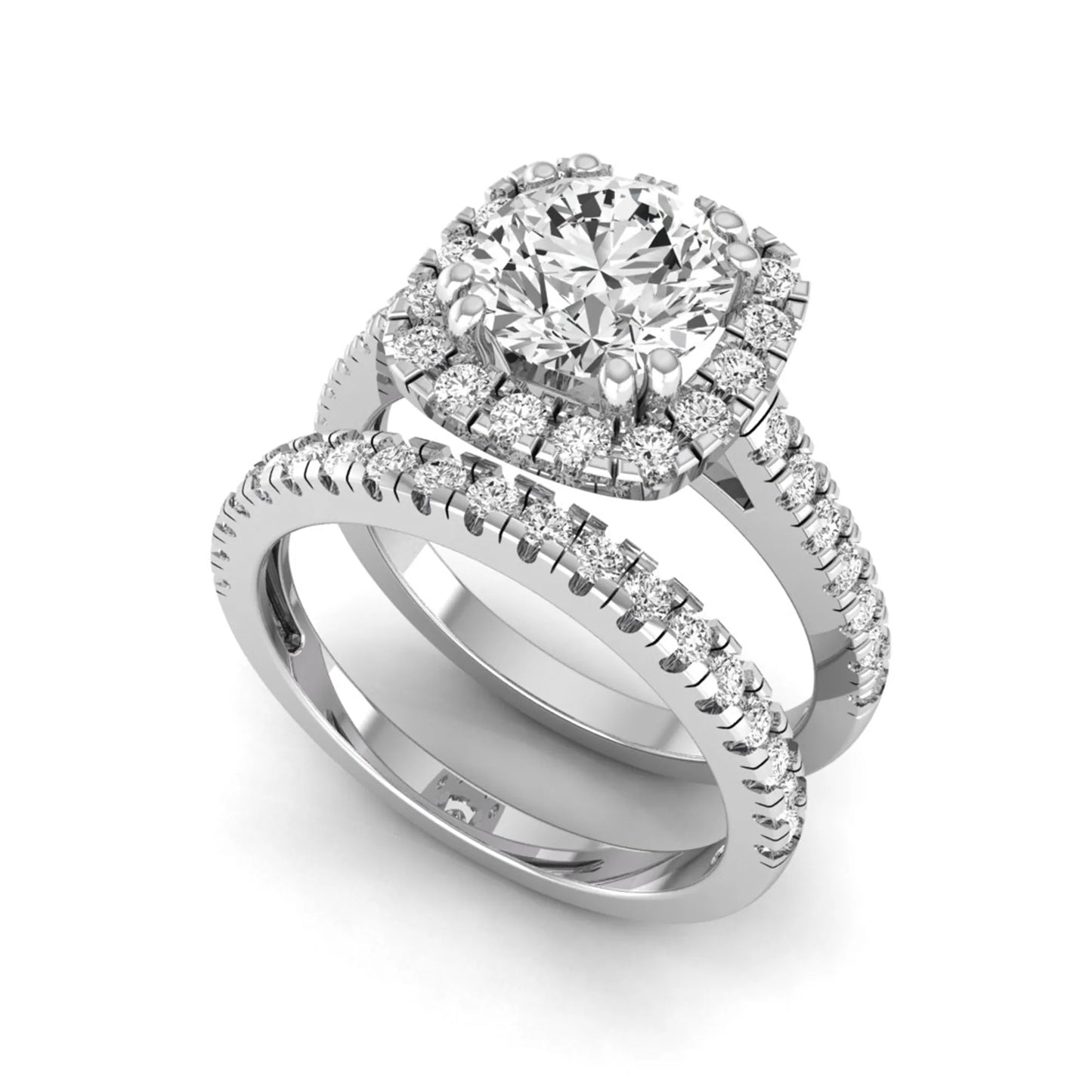 Round cut lab grown diamond halo bridal ring set featuring a split pavé engagement ring with matching diamond wedding band in white gold finish.