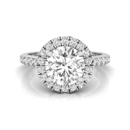 Round cut lab grown diamond engagement ring featuring a 1.33 carat center diamond surrounded by a round halo with a pavé diamond band and polished white gold finish.