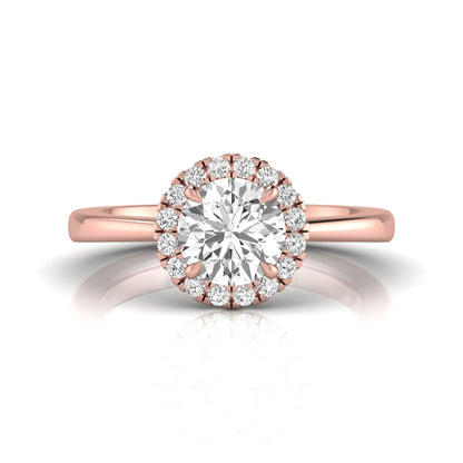 rose gold Round cut lab grown diamond halo engagement ring with round accent diamonds in a classic prong setting