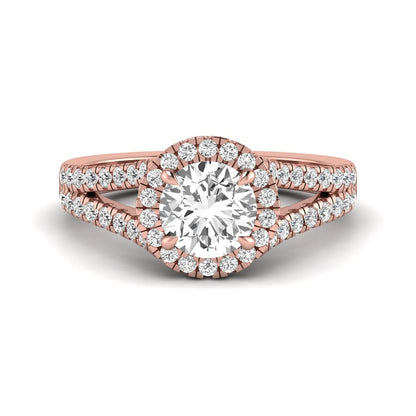 Round cut lab grown diamond halo engagement ring with pavé split shank and round accent diamonds in a rose gold tone design.