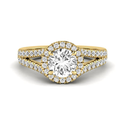 Round cut lab grown diamond halo engagement ring with pavé split shank and round accent diamonds in a yellow gold tone design.