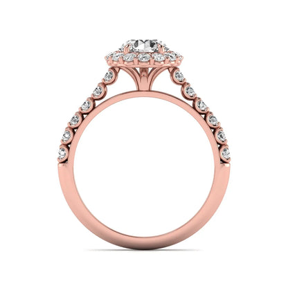 Round halo lab grown diamond engagement ring featuring a 6.50 mm round center diamond with pavé band and prong-set halo in a rose gold tone design.