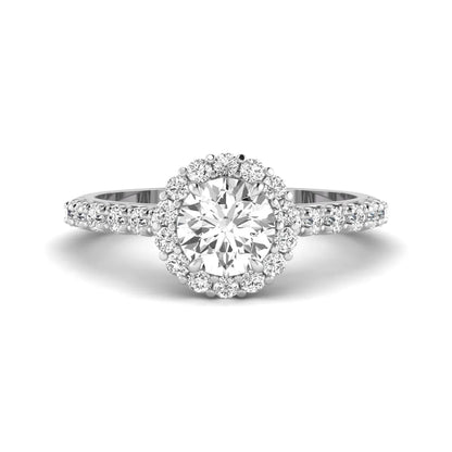 Round halo lab grown diamond engagement ring featuring a 6.50 mm round center diamond with pavé band and prong-set halo in a white gold tone design.