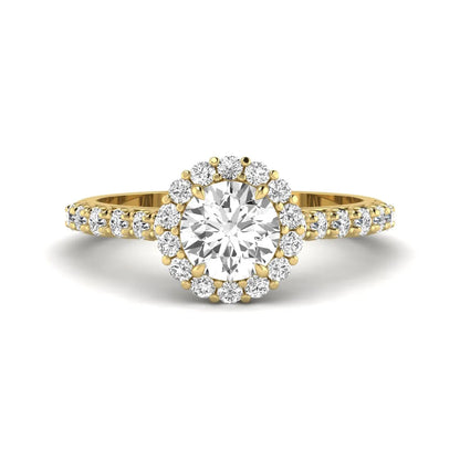 Round halo lab grown diamond engagement ring featuring a 6.50 mm round center diamond with pavé band and prong-set halo in a yellow gold tone design.