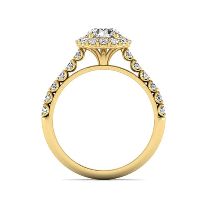 Round halo lab grown diamond engagement ring featuring a 6.50 mm round center diamond with pavé band and prong-set halo in a yellow gold tone design.