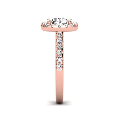 Round halo prong set lab grown diamond engagement ring featuring a 2.00 carat round center diamond with round halo and pavé accent diamonds in rose gold finish.