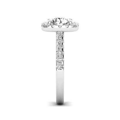 Round halo prong set lab grown diamond engagement ring featuring a 2.00 carat round center diamond with round halo and pavé accent diamonds in white gold finish.