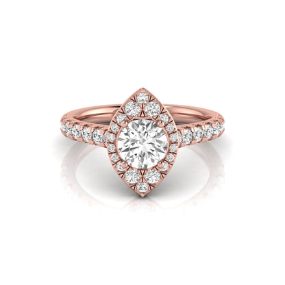 Round cut lab grown diamond engagement ring with a sparkling halo, pavé side stones, and four-prong setting in rose gold style.