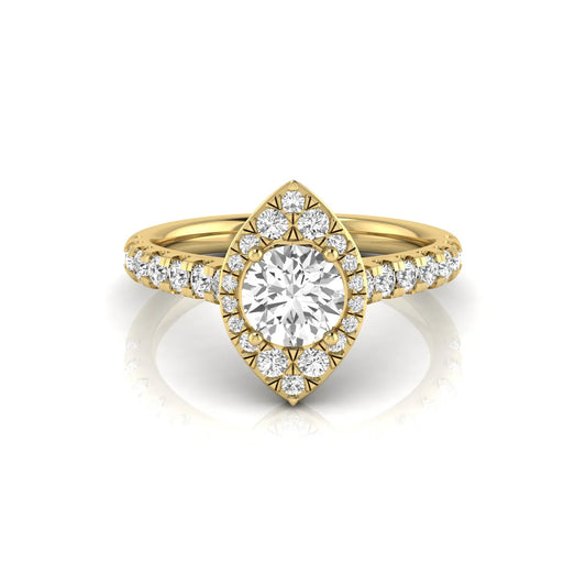 Round cut lab grown diamond engagement ring with a sparkling halo, pavé side stones, and four-prong setting in yellow gold style.