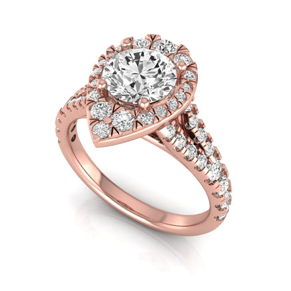 Round halo split shank lab grown diamond engagement ring featuring a round center diamond with pavé halo, cathedral gallery, and pavé-set split shank in rose gold tone.