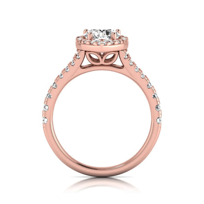 Round halo split shank lab grown diamond engagement ring featuring a round center diamond with pavé halo, cathedral gallery, and pavé-set split shank in rose gold tone.