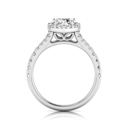Round halo split shank lab grown diamond engagement ring featuring a round center diamond with pavé halo, cathedral gallery, and pavé-set split shank in white gold tone.
