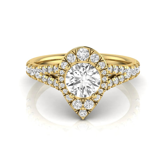 Round halo split shank lab grown diamond engagement ring featuring a round center diamond with pavé halo, cathedral gallery, and pavé-set split shank in yellow gold tone.