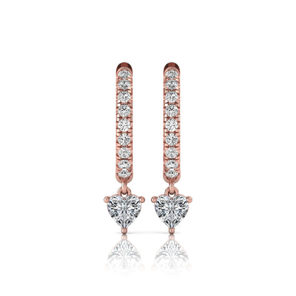 Round and heart cut lab grown diamond pavé drop huggie hoop earrings featuring a heart diamond drop, round pavé diamonds, hinged snap closure, and polished rose gold finish.
