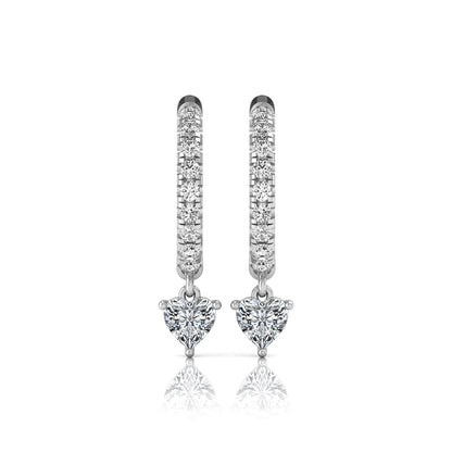 Round and heart cut lab grown diamond pavé drop huggie hoop earrings featuring a heart diamond drop, round pavé diamonds, hinged snap closure, and polished white gold finish.