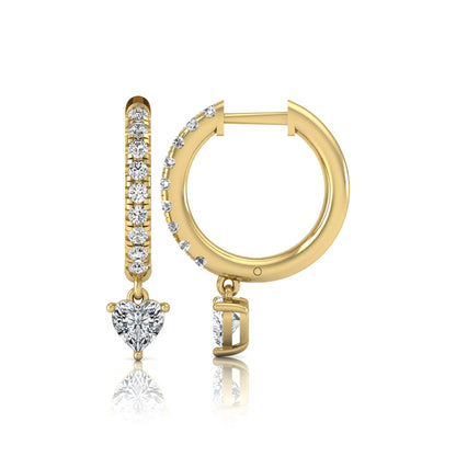 Round and heart cut lab grown diamond pavé drop huggie hoop earrings featuring a heart diamond drop, round pavé diamonds, hinged snap closure, and polished yellow gold finish.