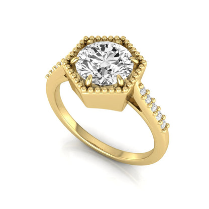 Round cut lab grown diamond engagement ring featuring a hexagon-inspired halo with pavé accent diamonds in a prong setting and polished yellow gold tone band.