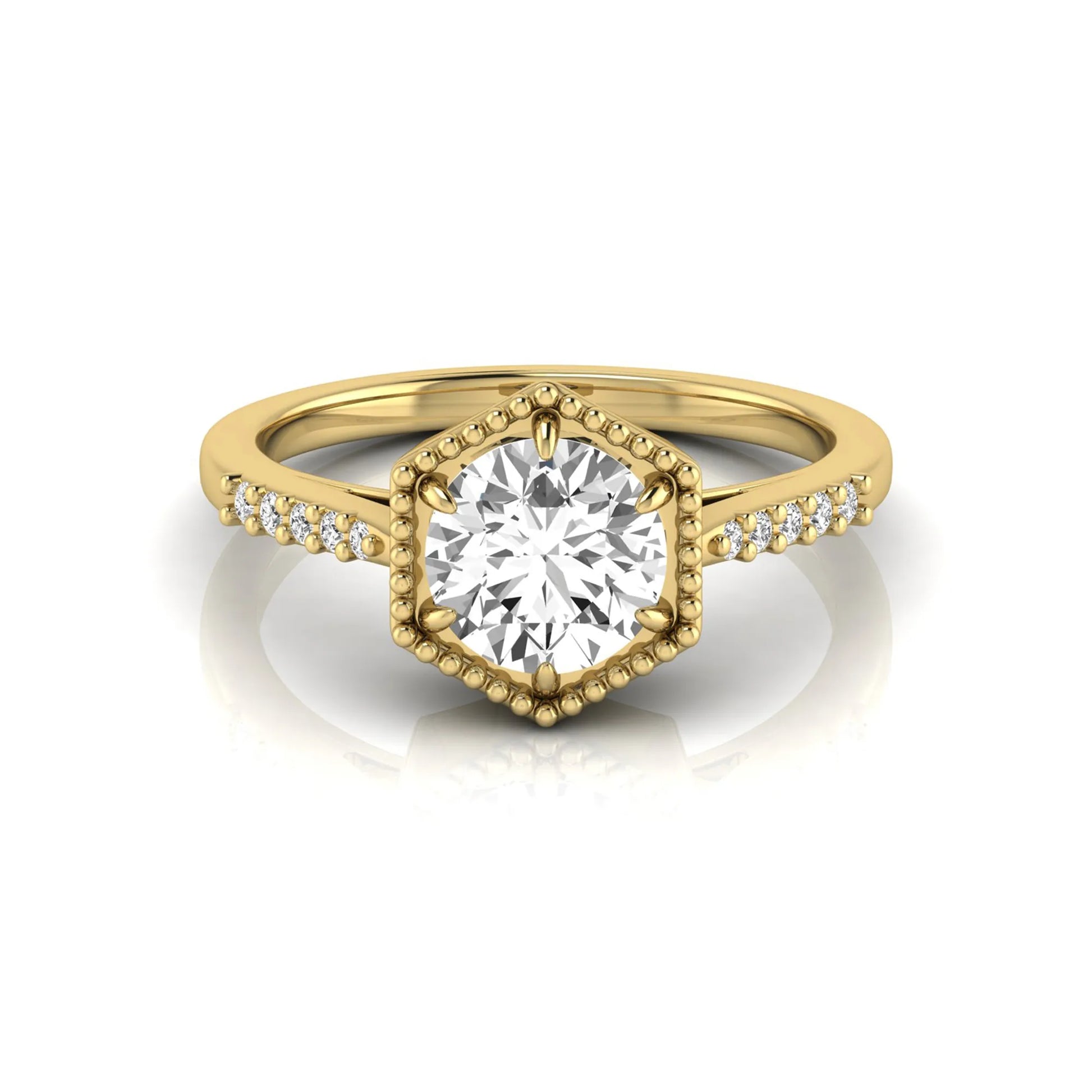 Round cut lab grown diamond engagement ring featuring a hexagon-inspired halo with pavé accent diamonds in a prong setting and polished yellow gold tone band.