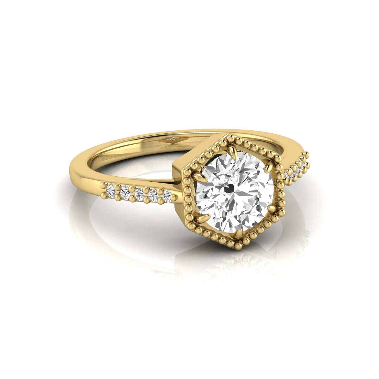 Round cut lab grown diamond engagement ring featuring a hexagon-inspired halo with pavé accent diamonds in a prong setting and polished yellow gold tone band.