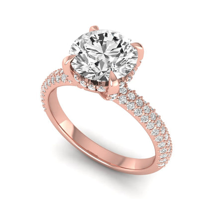 IGI Certified 2.04 carat round cut lab grown diamond hidden halo engagement ring with pavé diamond side stones in rose gold.