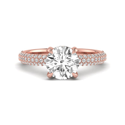 IGI Certified 2.04 carat round cut lab grown diamond hidden halo engagement ring with pavé diamond side stones in rose gold.