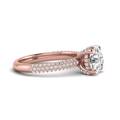 IGI Certified 2.04 carat round cut lab grown diamond hidden halo engagement ring with pavé diamond side stones in rose gold.