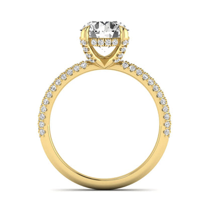 IGI Certified 2.04 carat round cut lab grown diamond hidden halo engagement ring with pavé diamond side stones in yellow gold.