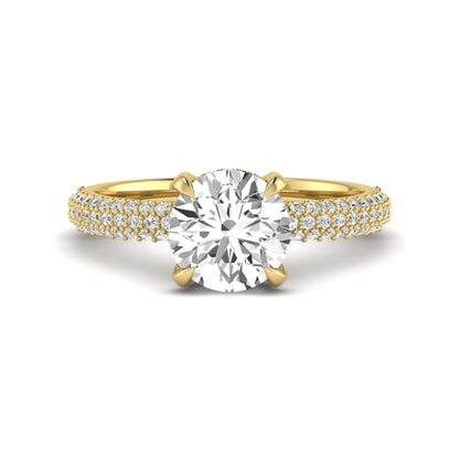 IGI Certified 2.04 carat round cut lab grown diamond hidden halo engagement ring with pavé diamond side stones in yellow gold.
