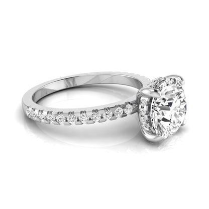 Round cut lab grown diamond engagement ring featuring a hidden halo, pavé accent side diamonds, and a four-prong setting in a white gold tone with an IGI certified 1.28 carat center diamond.