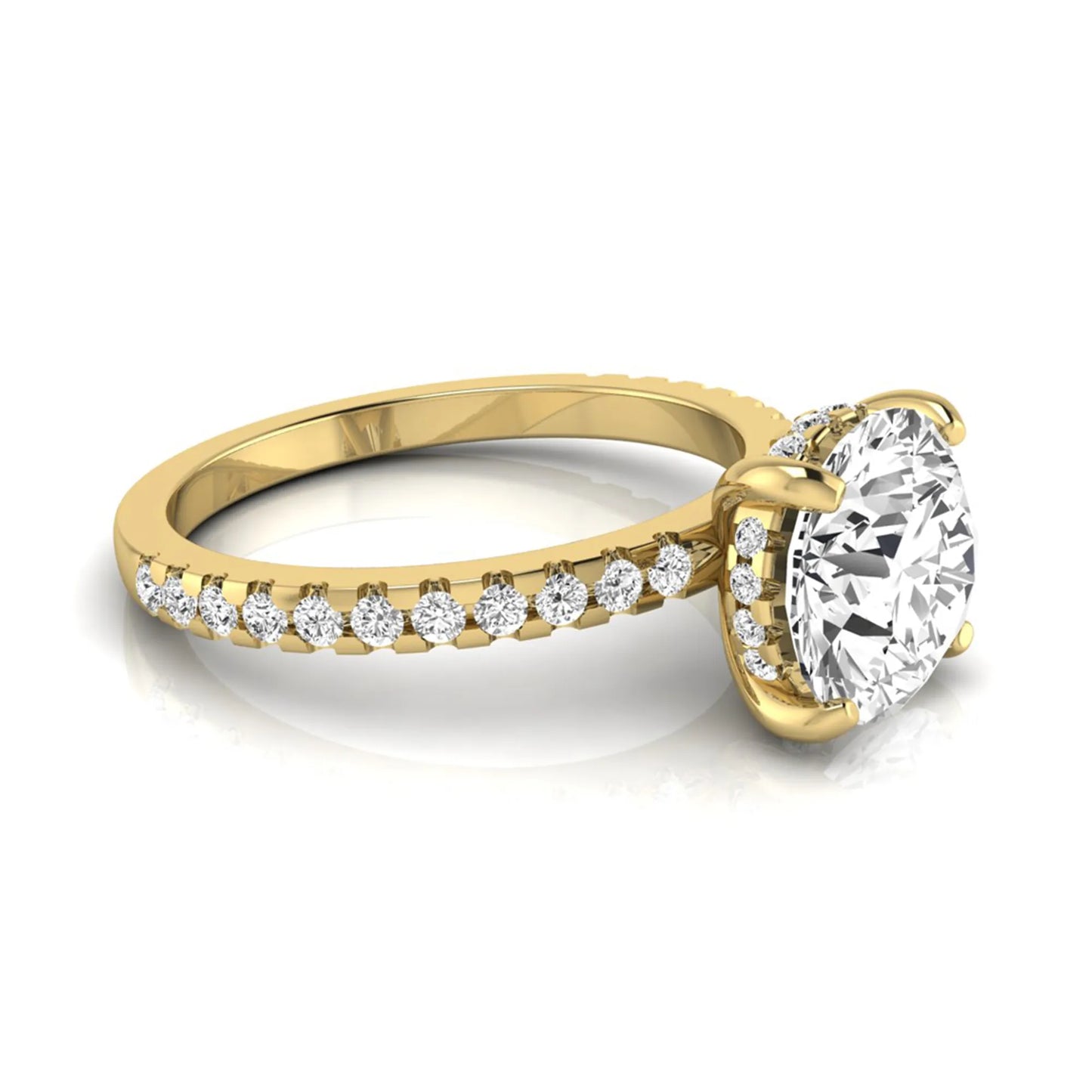 Round cut lab grown diamond engagement ring featuring a hidden halo, pavé accent side diamonds, and a four-prong setting in a yellow gold tone with an IGI certified 1.28 carat center diamond.
