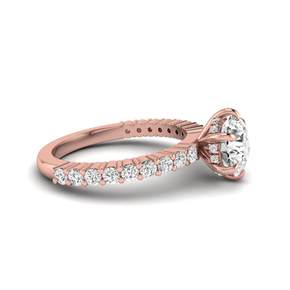 Round hidden halo lab grown diamond engagement ring featuring a round cut center diamond with pavé band in rose gold design.