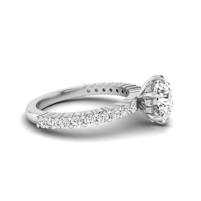 Round hidden halo lab grown diamond engagement ring featuring a round cut center diamond with pavé band in white gold design.