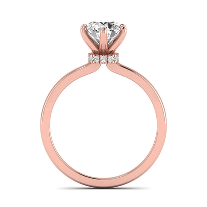Round cut lab grown diamond solitaire engagement ring with hidden halo and six-prong setting in a rose gold tone design.