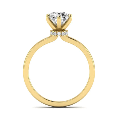 Round cut lab grown diamond solitaire engagement ring with hidden halo and six-prong setting in a yellow gold tone design.