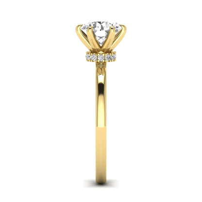 Round cut lab grown diamond solitaire engagement ring with hidden halo and six-prong setting in a yellow gold tone design.