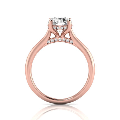 Round hidden halo lab grown diamond solitaire engagement ring featuring a 2.04 carat IGI certified round diamond in a four-prong setting with a polished rose gold band.