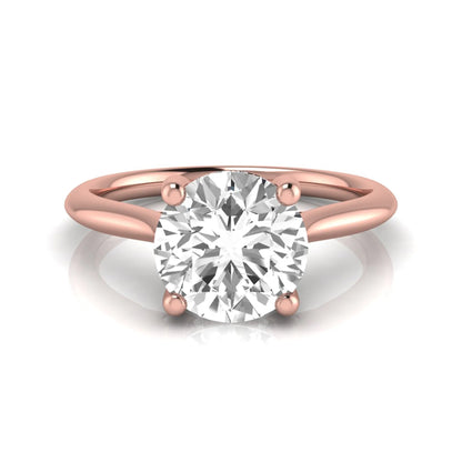 Round hidden halo lab grown diamond solitaire engagement ring featuring a 2.04 carat IGI certified round diamond in a four-prong setting with a polished rose gold band.