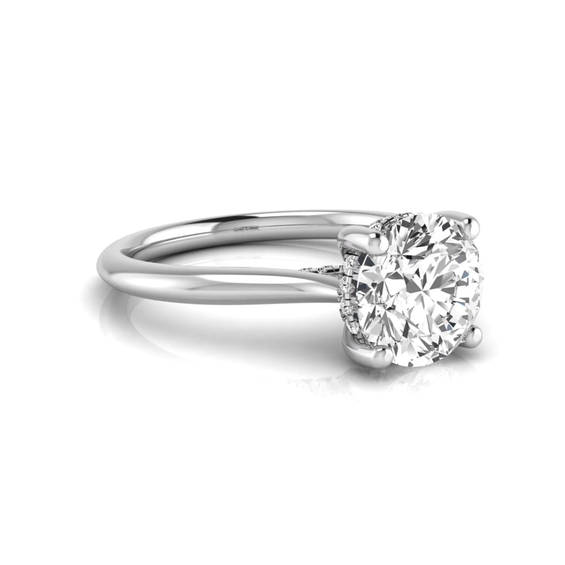 Round hidden halo lab grown diamond solitaire engagement ring featuring a 2.04 carat IGI certified round diamond in a four-prong setting with a polished white gold band.