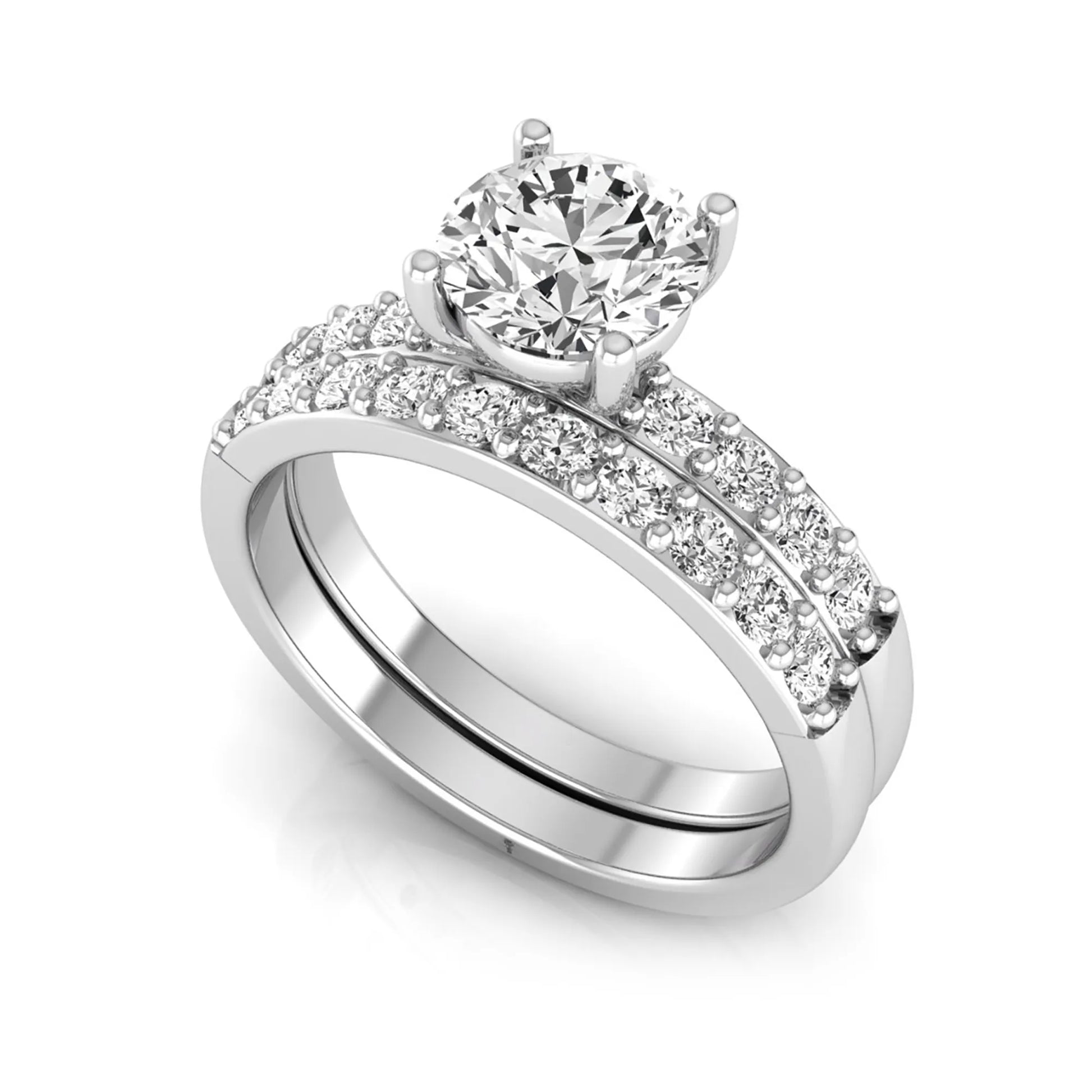 Round cut lab grown diamond bridal ring set featuring a 1.03 carat IGI certified solitaire engagement ring with a double pavé diamond band and matching diamond wedding band in polished white gold.