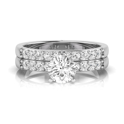 Round cut lab grown diamond bridal ring set featuring a 1.03 carat IGI certified solitaire engagement ring with a double pavé diamond band and matching diamond wedding band in polished white gold.