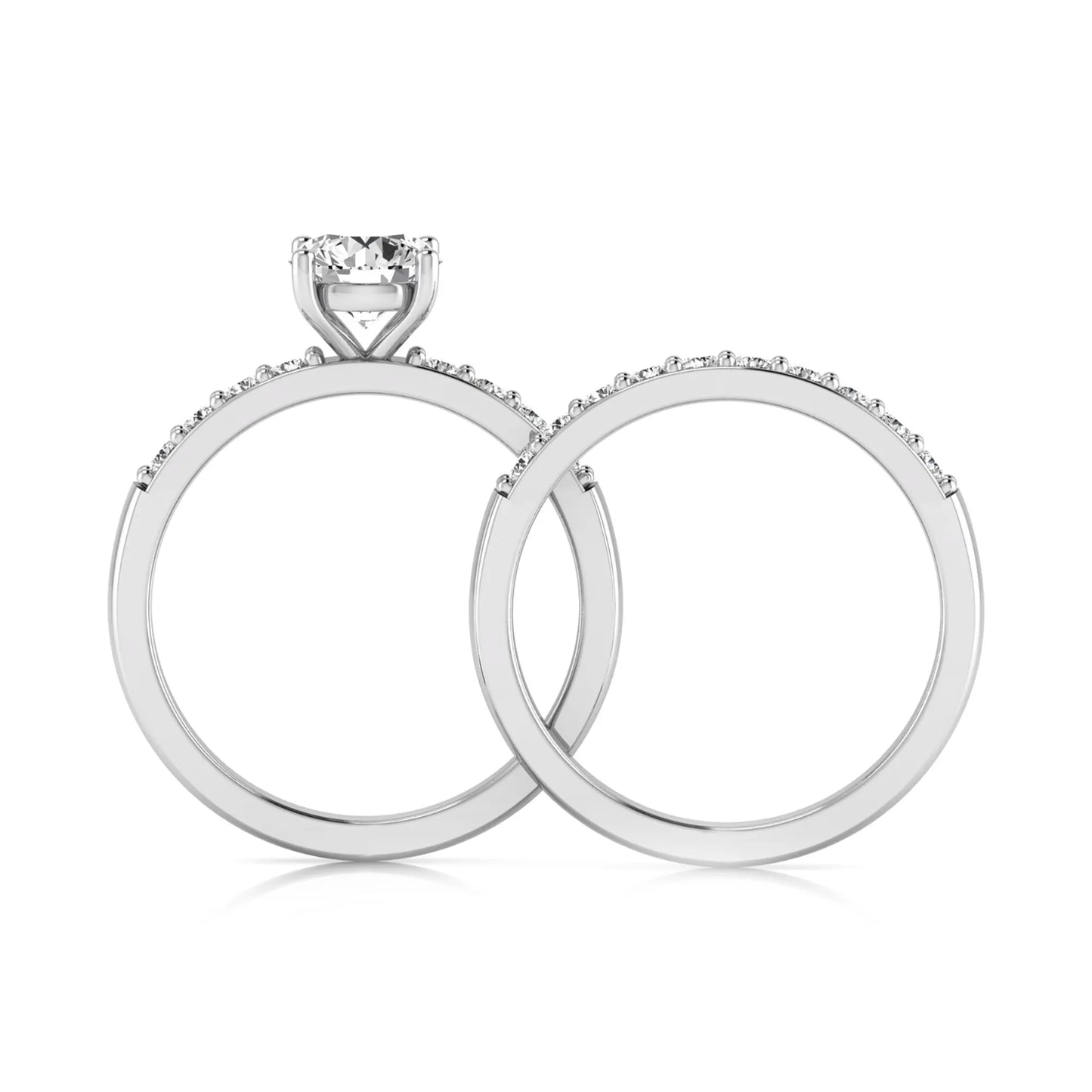 Round cut lab grown diamond bridal ring set featuring a 1.03 carat IGI certified solitaire engagement ring with a double pavé diamond band and matching diamond wedding band in polished white gold.