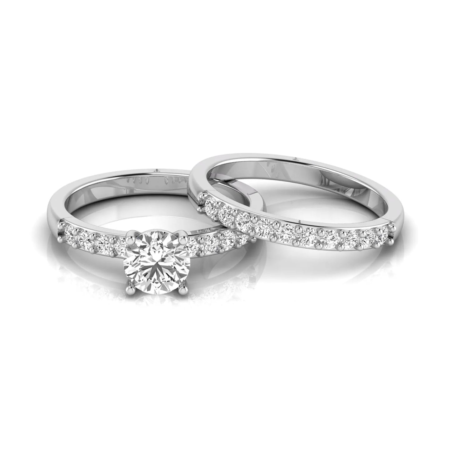 Round cut lab grown diamond bridal ring set featuring a 1.03 carat IGI certified solitaire engagement ring with a double pavé diamond band and matching diamond wedding band in polished white gold.