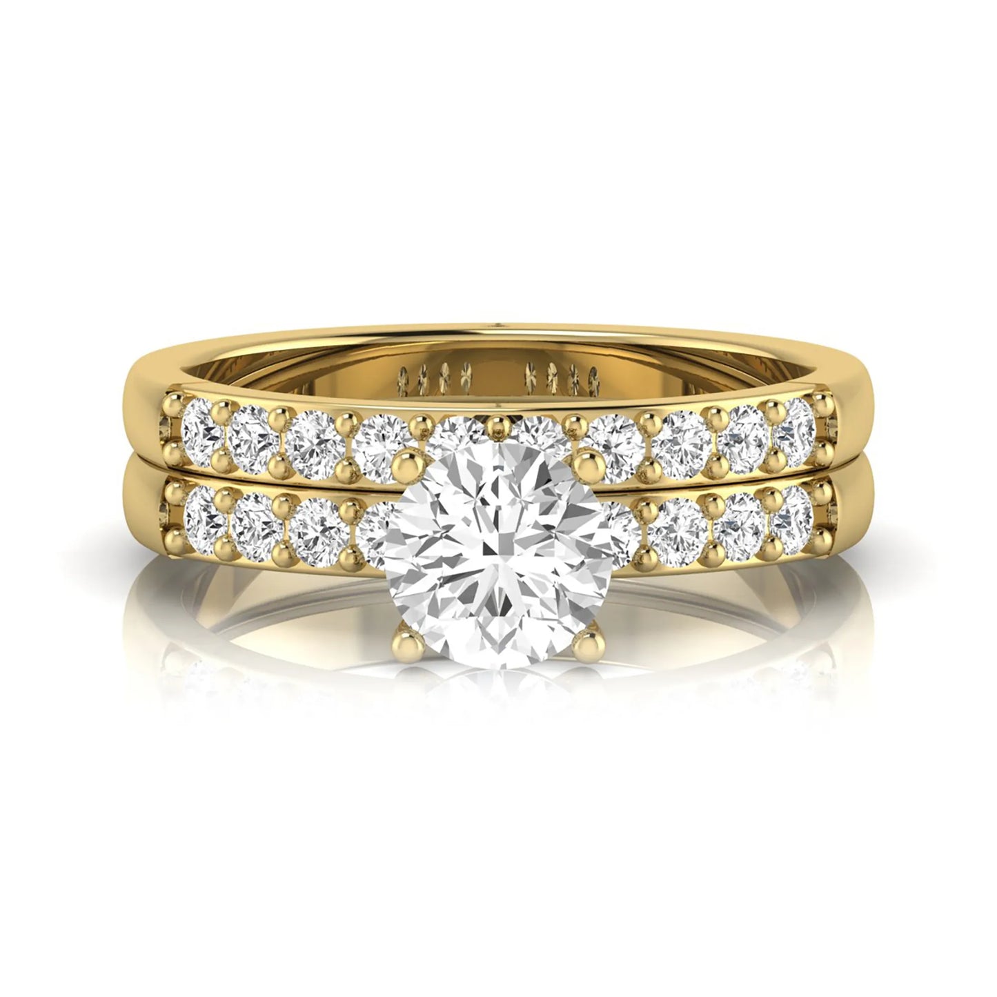 Round cut lab grown diamond bridal ring set featuring a 1.03 carat IGI certified solitaire engagement ring with a double pavé diamond band and matching diamond wedding band in polished yellow gold.