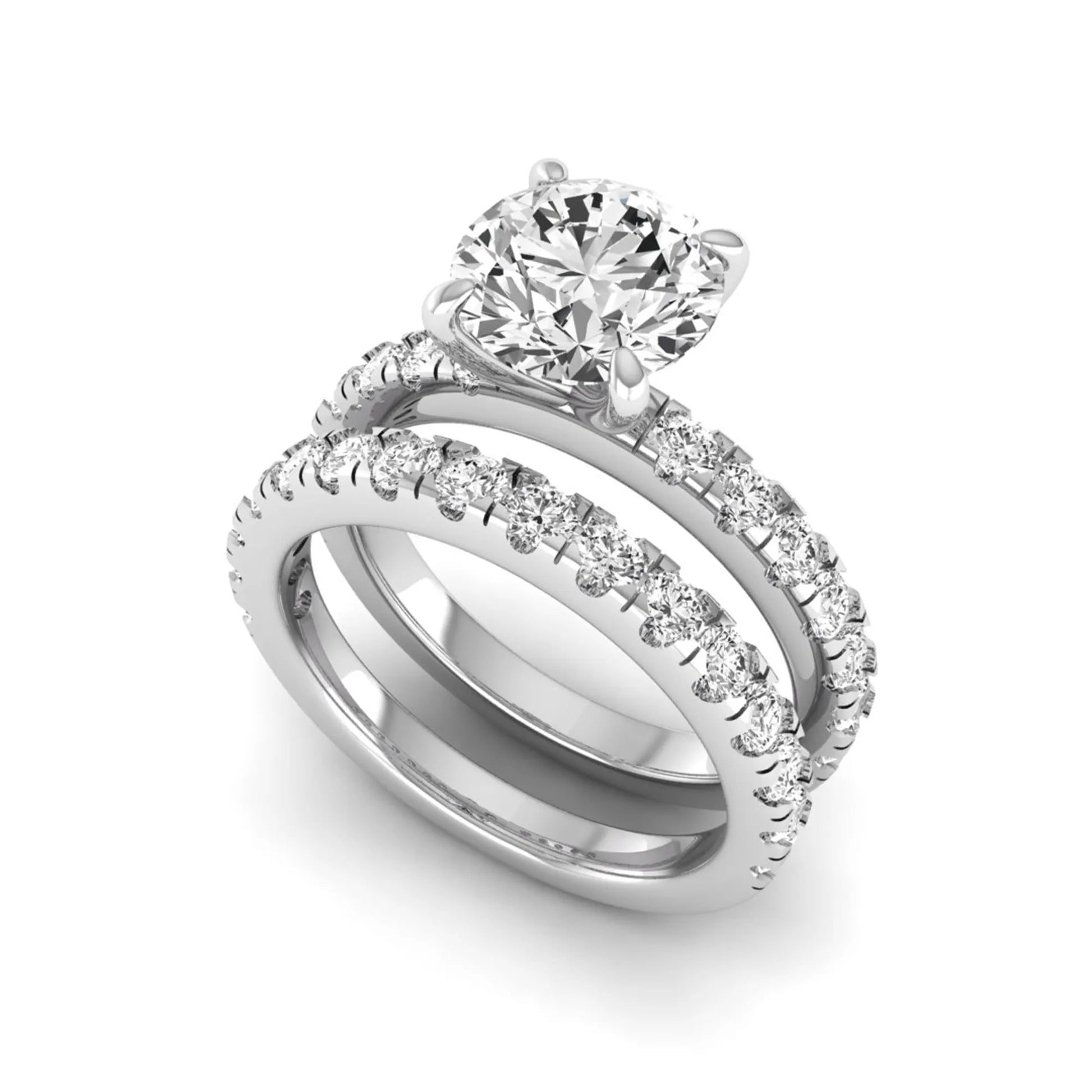 Round cut lab grown diamond bridal ring set in white gold featuring a 1.67 carat IGI certified center diamond with matching diamond wedding band.