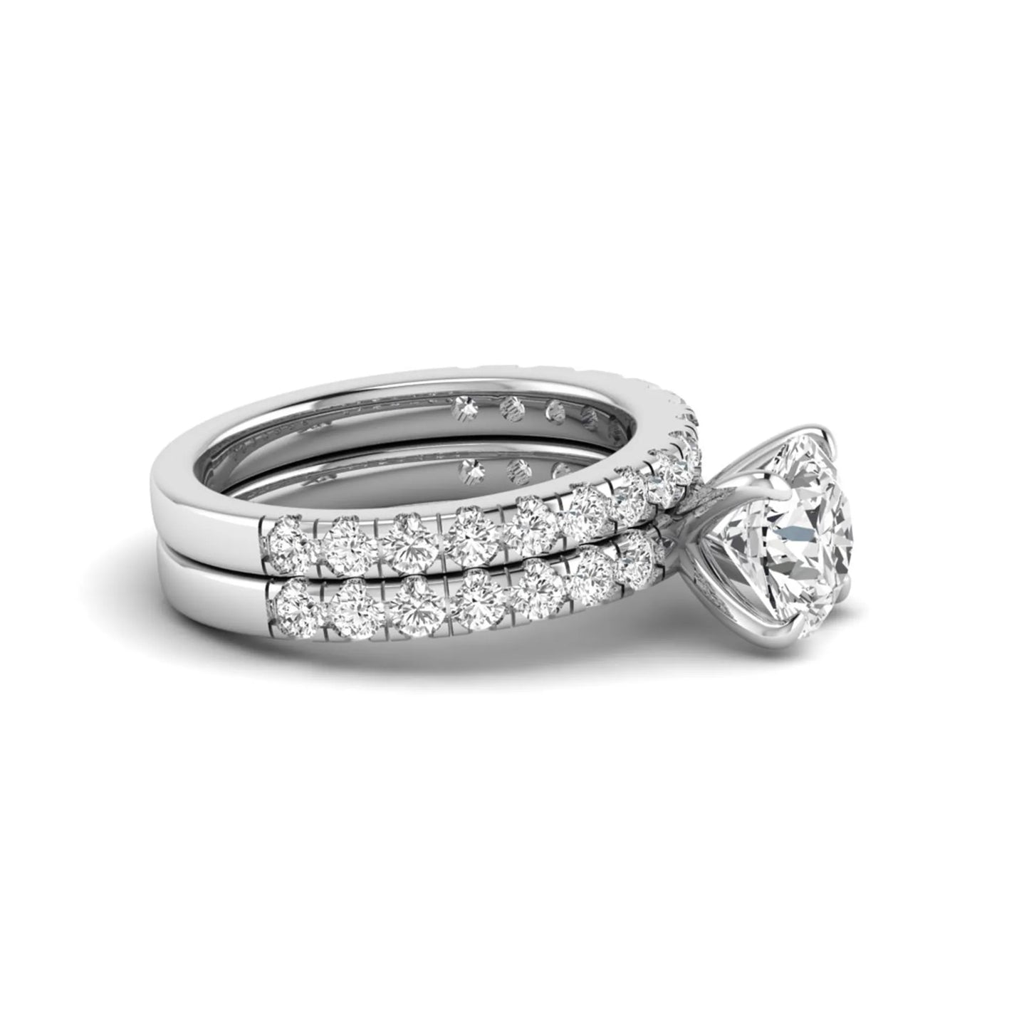 Round cut lab grown diamond bridal ring set in white gold featuring a 1.67 carat IGI certified center diamond with matching diamond wedding band.